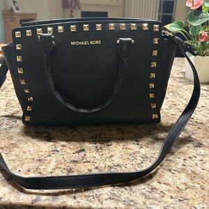 Studied black purse.